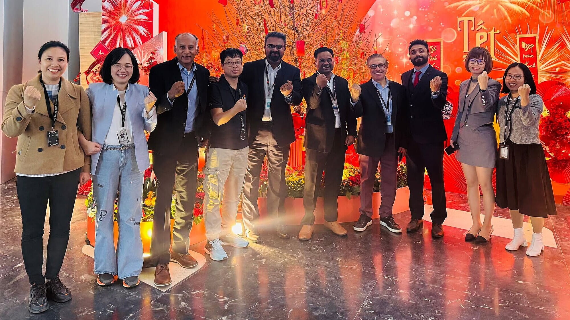 The FPT Automotive project team and Omnex Certification Organization take a commemorative photo during an assessment visit.