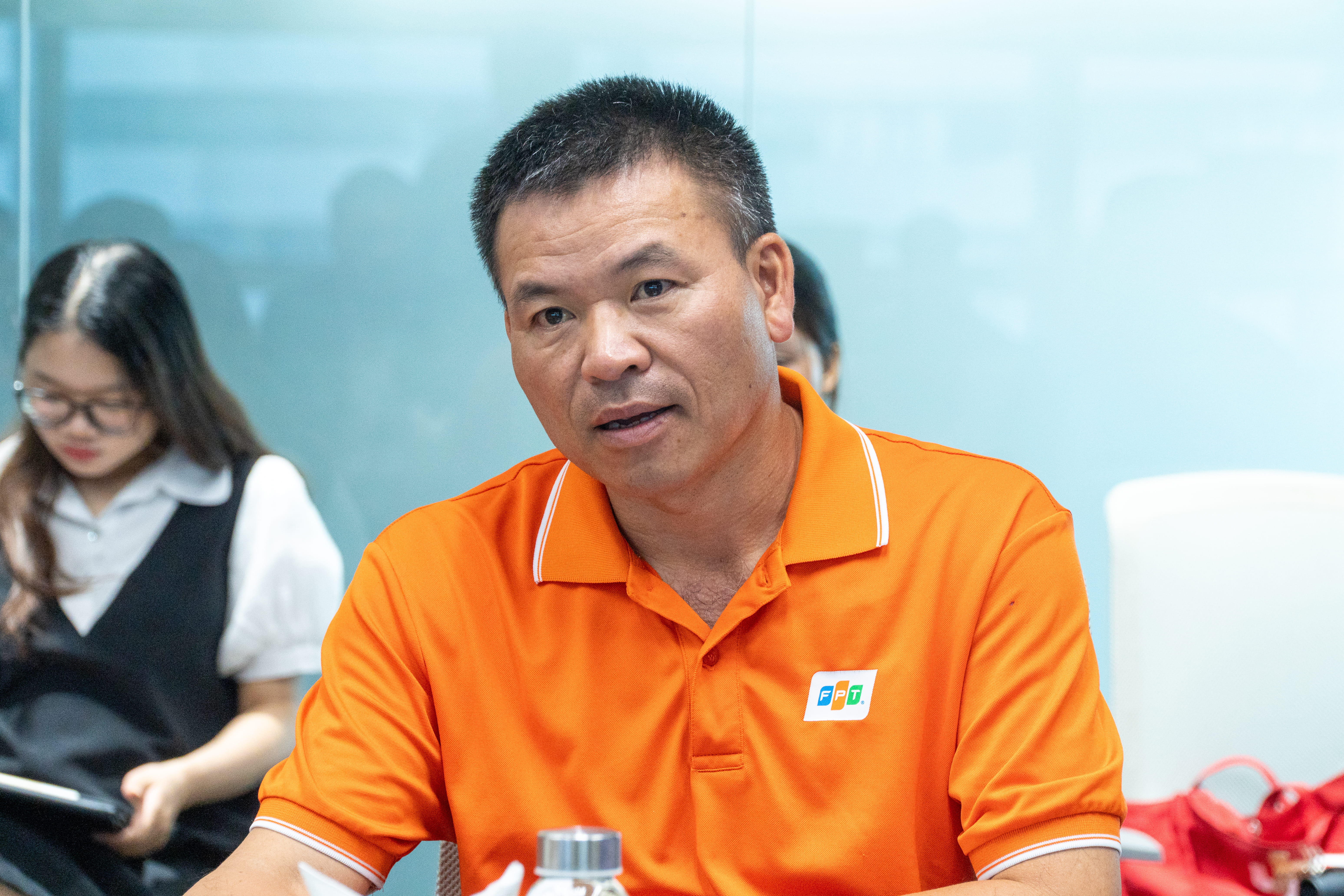 Mr. Tran Phong Lam, representative of FPT, speaking at the event.
